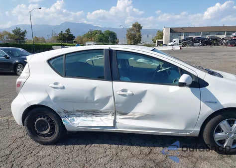 2012 Toyota Prius C Three from USA, damaged, VIN JTDKDTB32C1001543